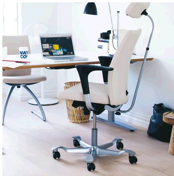A modern office setting featuring a stylish office chair