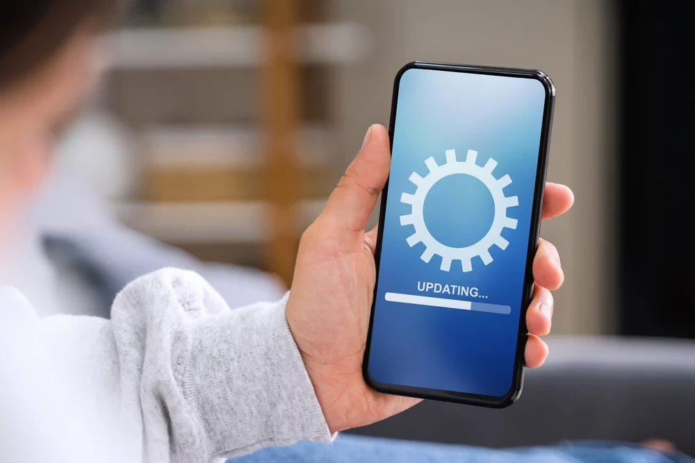 A closeup of a smartphone installing an update.