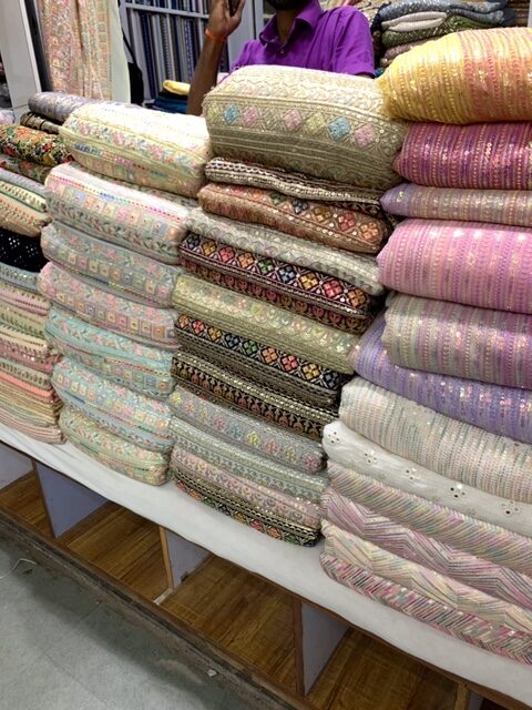 Stack of brocade fabric in Mumbai textile market