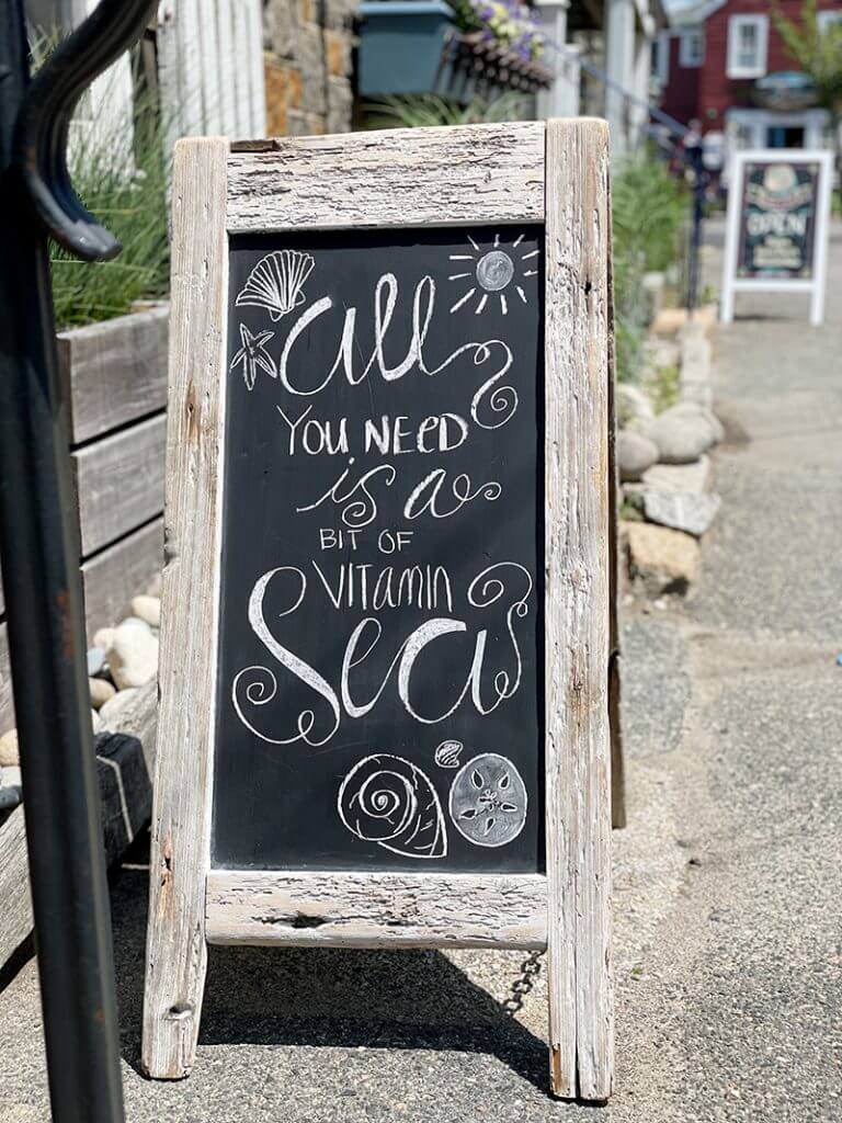 Sign outside the One Ocean store in Rockport, MA