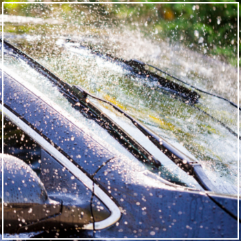 windshield wipers on during rainstorm