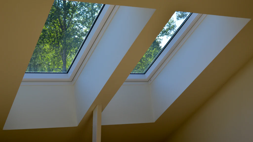 Two skylight windows adding brightness to a room