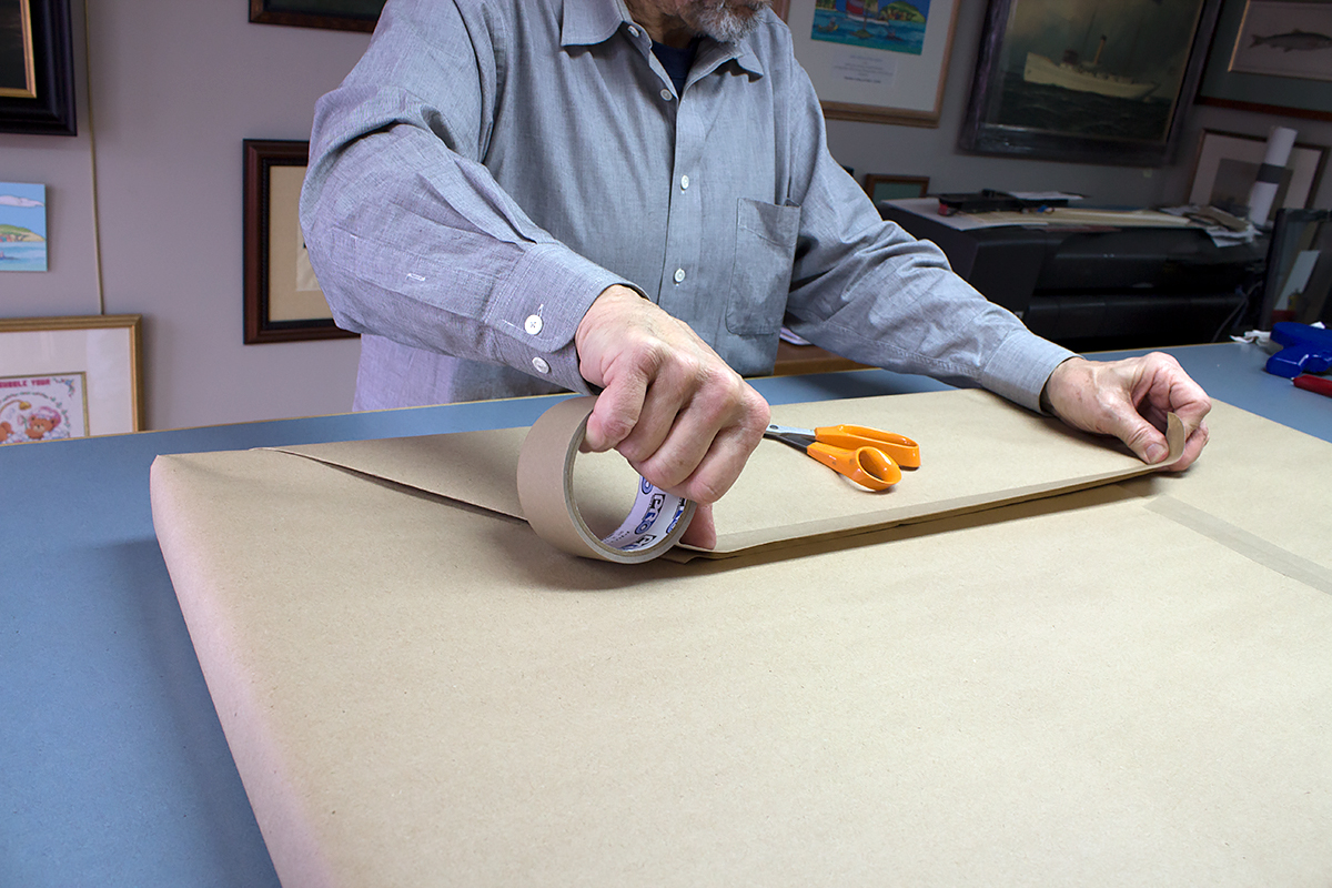 Utilizing ProÂ® 183 Kraft Tape to complete the wrapping of the frame job for that gallery finish.
