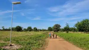 people on dirt road