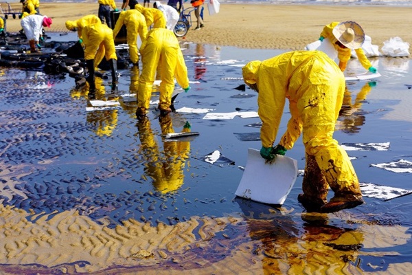 Oil Spill Yellow Coveralls
