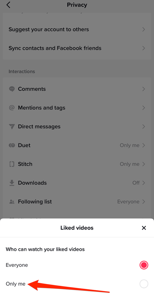 Screenshot of TikTok's "Privacy" menu showing the "Liked videos" options window that has appeared on the screen. A red arrow points at "Only me" on this window.