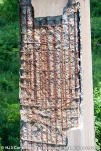 Exposed rebar on bridge column