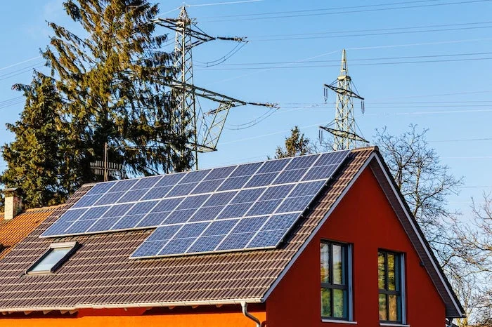 Solar panels are operating on the roof during sunny days.