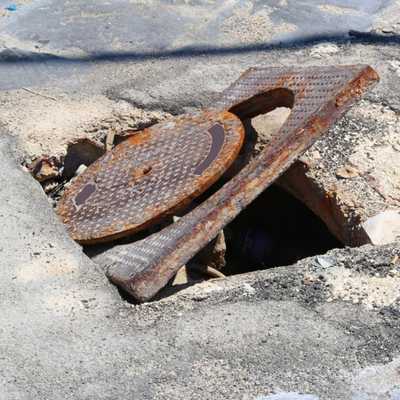 Broken Manhole Cover Image