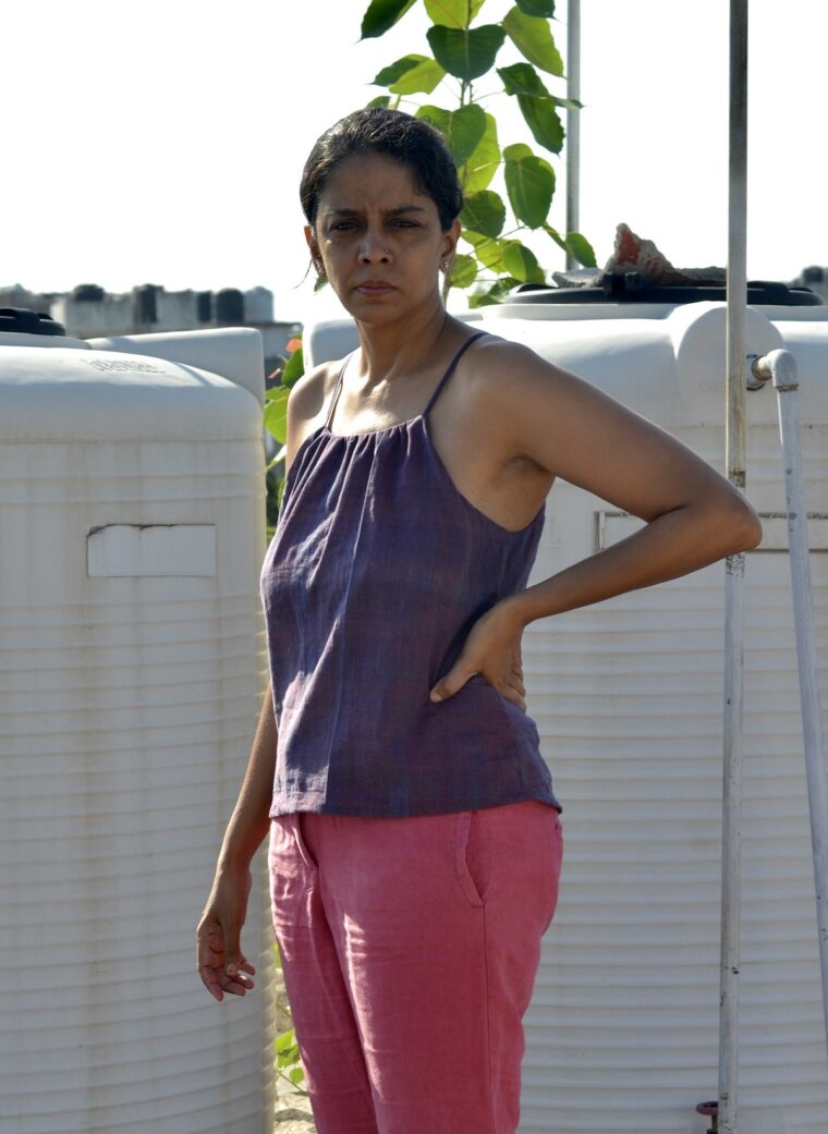 Woman wearing Liesl + Co Enmore Top