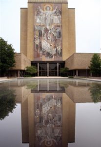 This July 31, 2008 photo shows the Hesburgh Library on the campus of Notre Dame University in Notre Dame, Indiana. The library is adorned with the mosaic 'The Word of Life', which depicts Christ the teacher surrounded by saints and scholars. The mosaic is also referred to as 'Touchdown Jesus', because it aligns perfectly with the end zone of Notre Dame's football stadium, creating the illusion that Jesus is signaling a touchdown. AFP PHOTO/Karen BLEIER (Photo credit should read KAREN BLEIER/AFP/Getty Images)