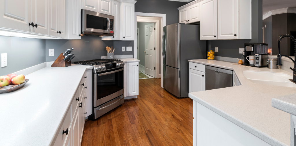 Colors of Corian shown in white kitchen