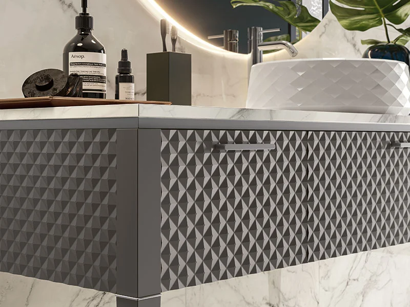 LamÃ¨ bathroom vanity with matching pattern side panel and cabinet front