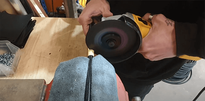 cut through the AN hose using a disc cutter and 1mm cutting disc