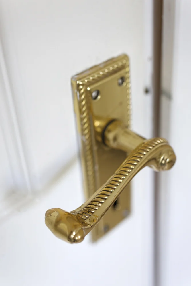 Image of an interior door handle with lock