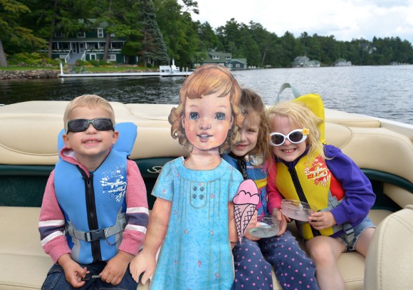Flat S with kids in boat having ice cream