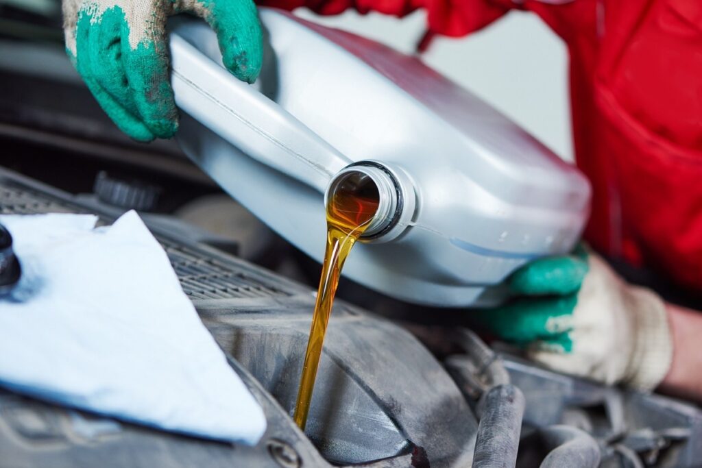 Austin mechanic performing oil change service