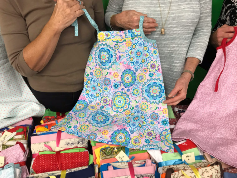 Virginia sewing group creates 72 Popover Sundresses for charity.