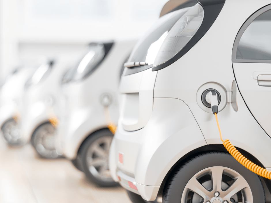 Line of electric cars getting charged.