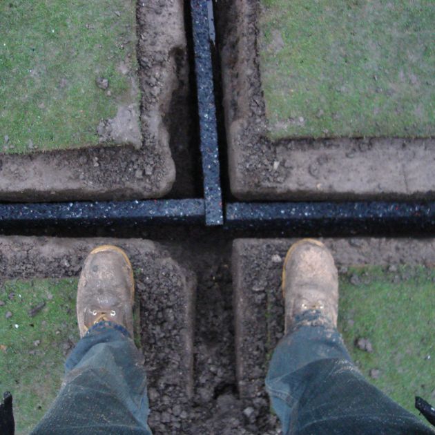 enviroflow drainage plank being installed as a french drain