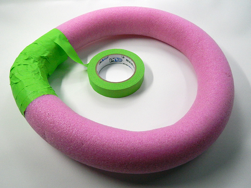 Connect the two ends together wrapping the tape in a figure 8 pattern.