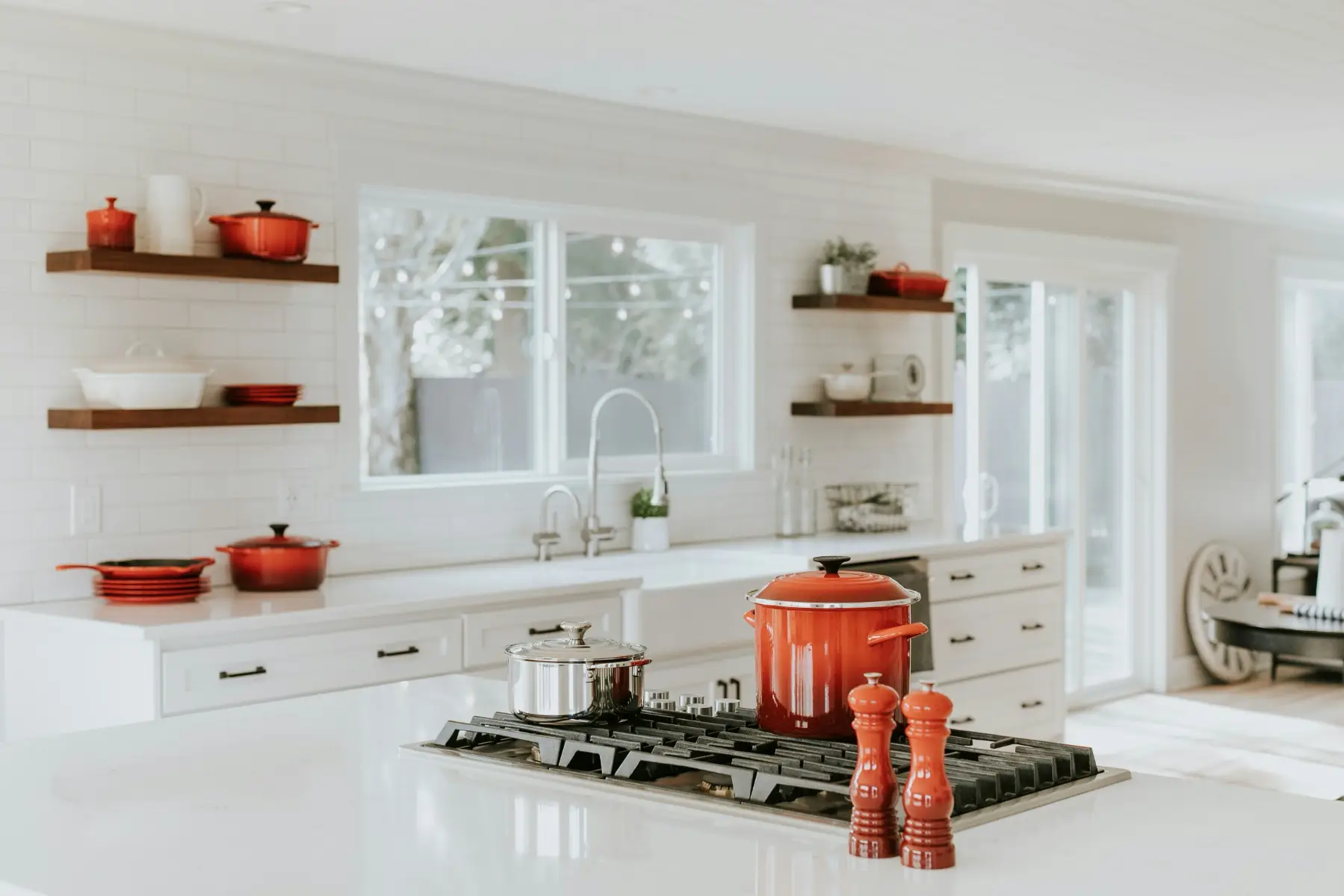 Open Space White Kitchen with Bright Lighting
