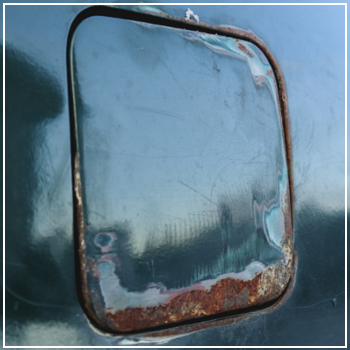 rust on fuel tank cover