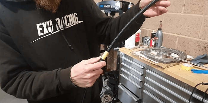 place masking tape around both ends of the AN hose