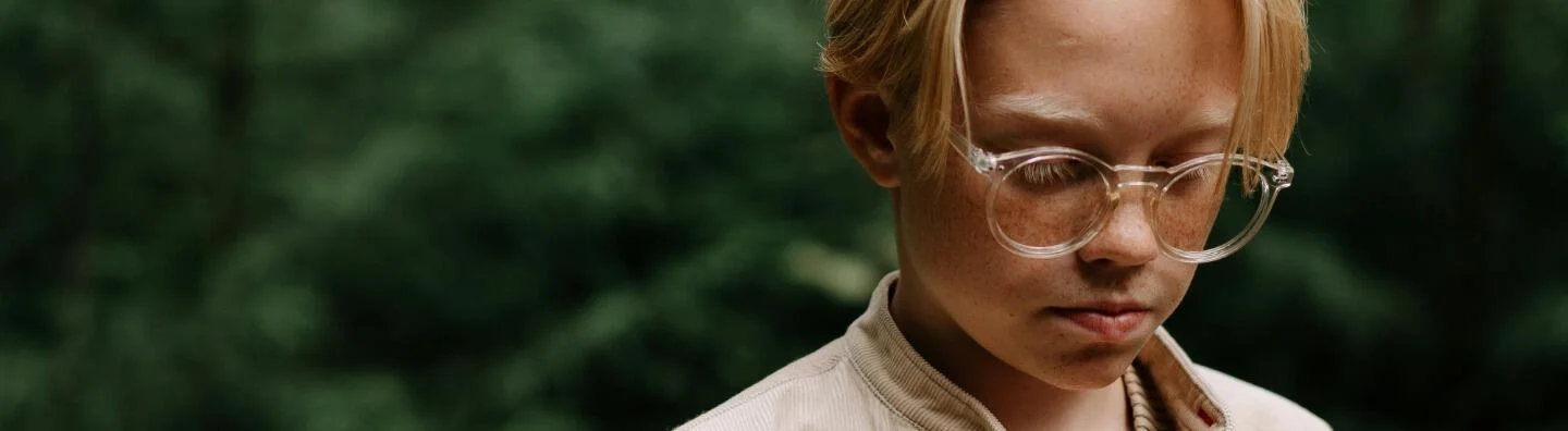 Boy wearing glasses
