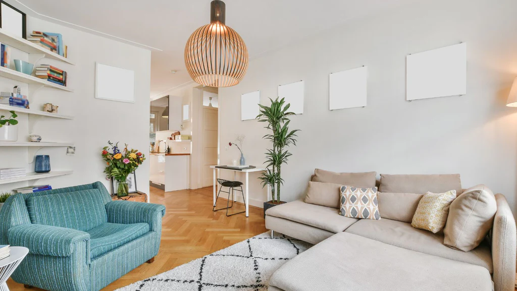 A living room featuring a globe chandelier