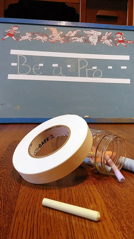 This manuscript line I created with Pro GaffÂ®. My daughter will be practicing her writing, thanks to a quick application of Pro GaffÂ® to this old chalkboard.