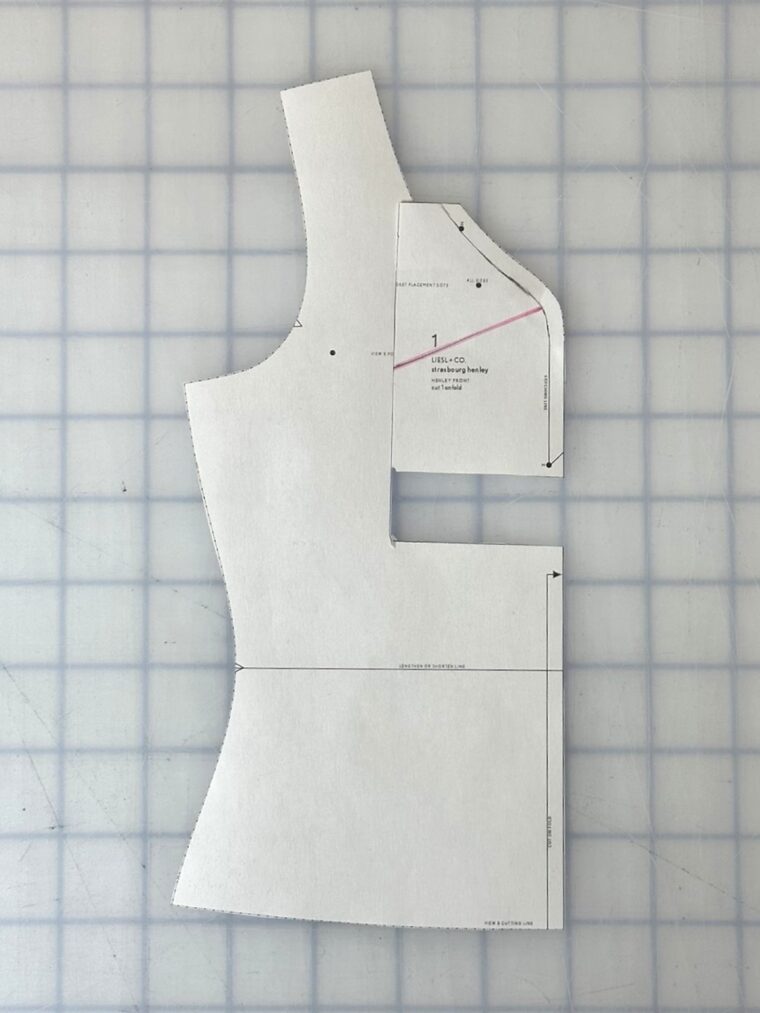 Front bodice pattern piece with a rectangle drawn around the center front neckline. The rectangle has been shifted upward.