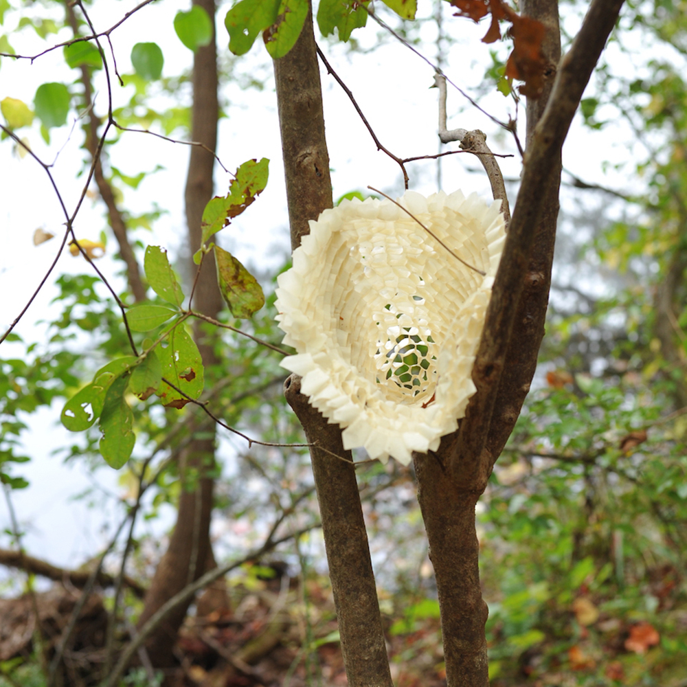 This tape sculpture by Paula Reynaldi was made with ProÂ® 796. The sculpture evokes the structure of honeycomb or fungi, and it resists weather conditions as well.