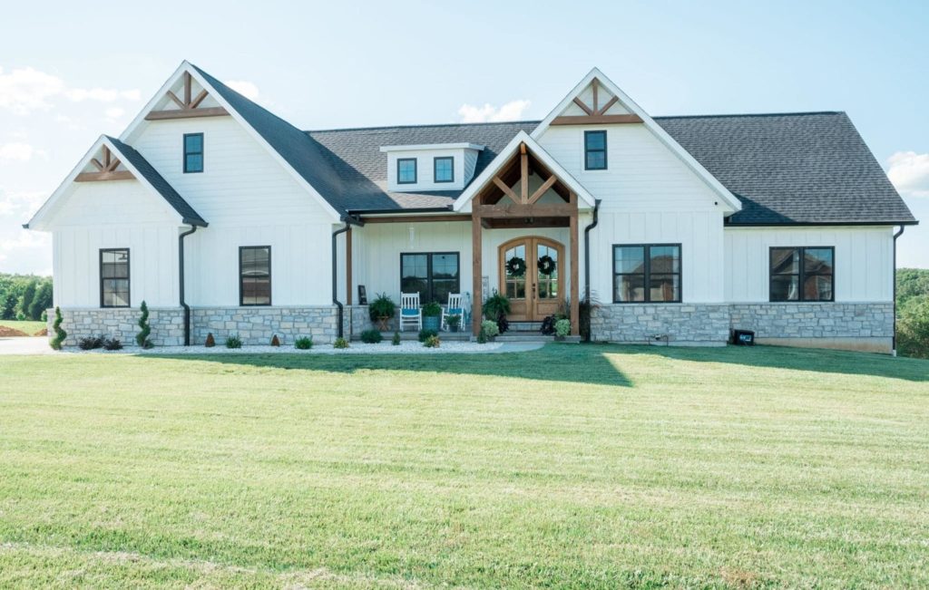 a classic farmhouse with lots of white and wood accents
