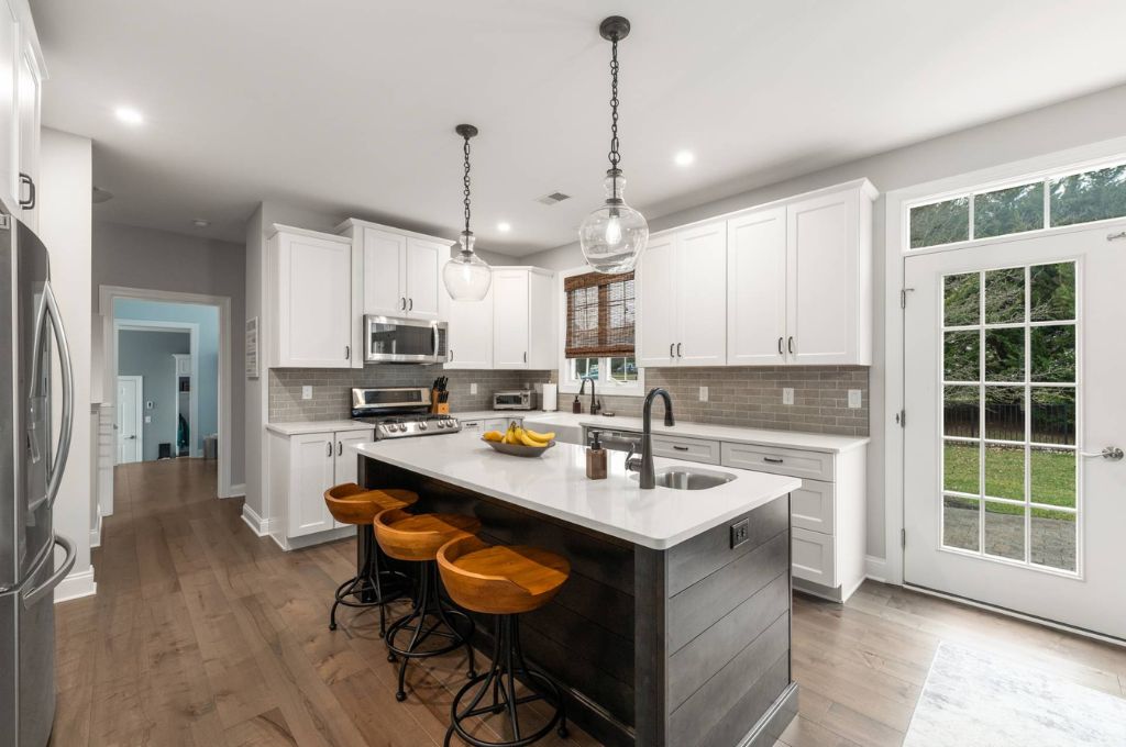 White Countertop with Black Base Kitchen Island