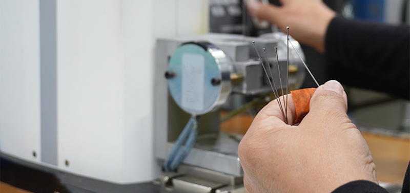 Cable assembly with a ball fitting being proof load tested