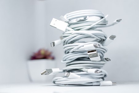 USB wires coiled on a desk