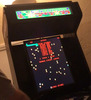 Automatic rotating arcade cabinet display