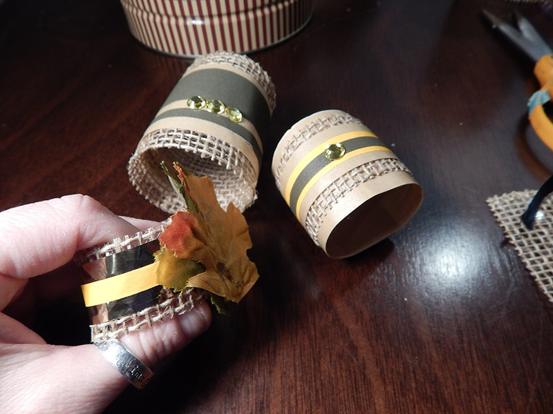 I even wrap the burlap around my napkins and made some napkin rings to match. Then I just added embellishments like ProÂ® Sheen strips and rhinestones from my local craft store.