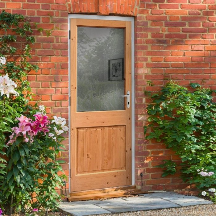 Wooden external door with glass pane