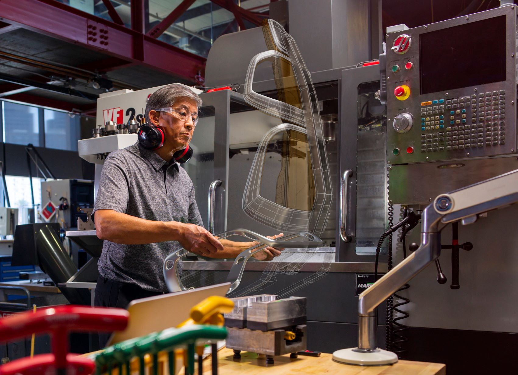 Man working with CNC machinery at the Autodesk San Francisco Technology Center.