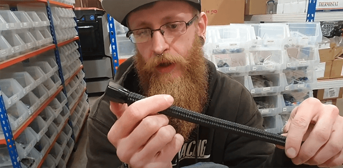 the AN fitting fully seated against the AN braided hose