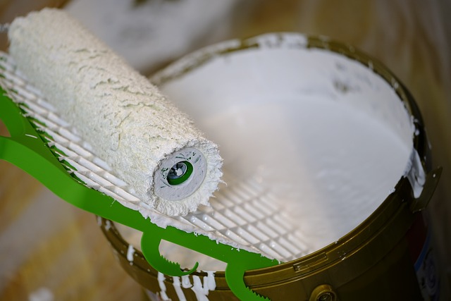 White paint and roller