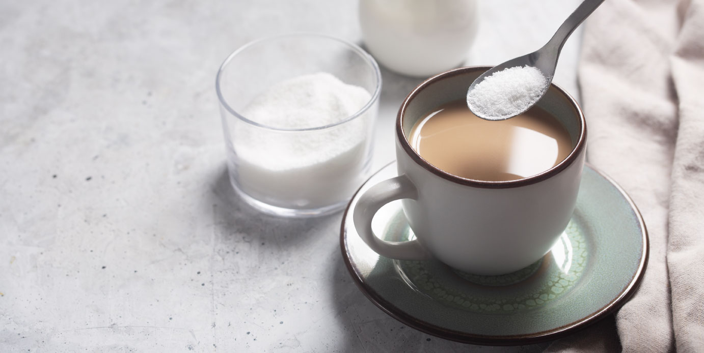 Aspartame Powder: Ultimate Sugar Substitute for Health-Conscious Consumers A cup of coffee on a saucer with a spoon of sugar above it