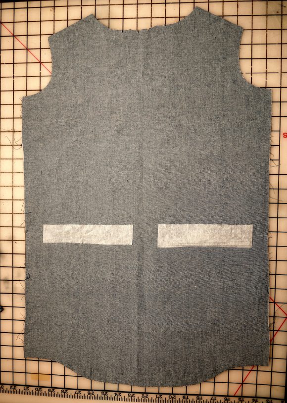 exposed zippers on welt pockets