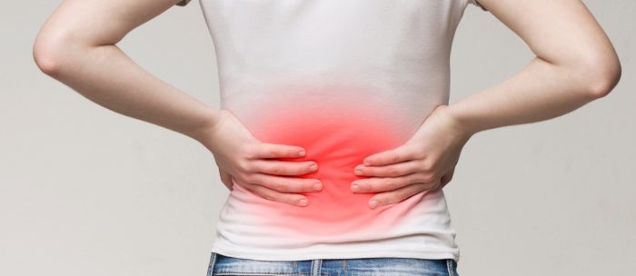 Source: https://stock.adobe.com/uk/images/young-woman-holding-her-painful-inflamed-loin/264911750