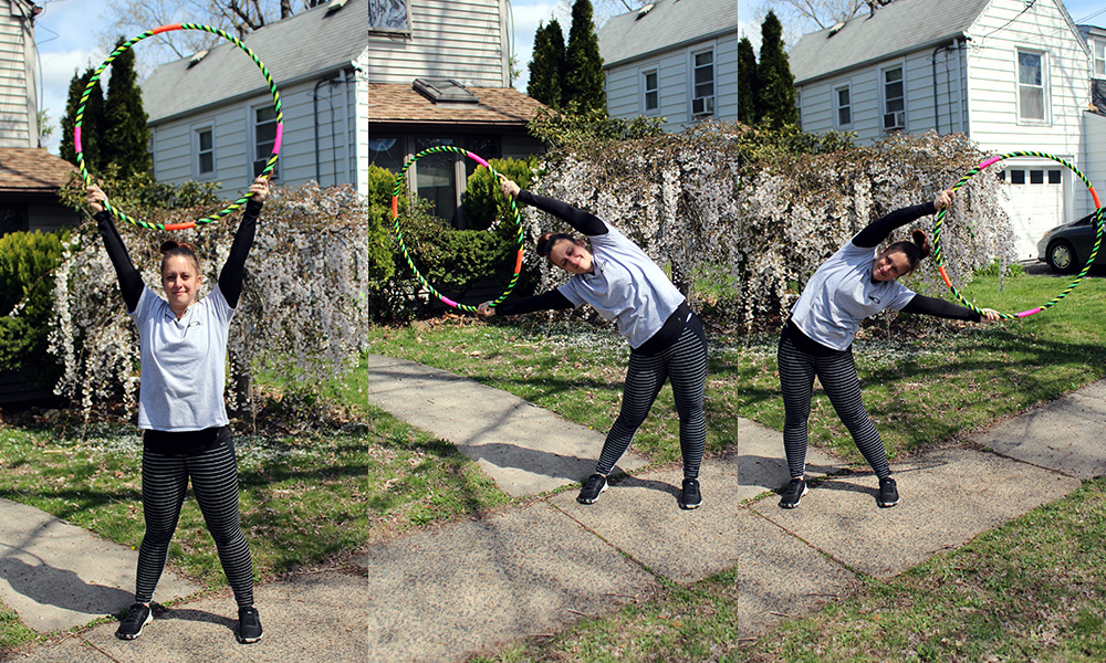 Warm Up Side stretching, holding the hula hoop at 9 & 3