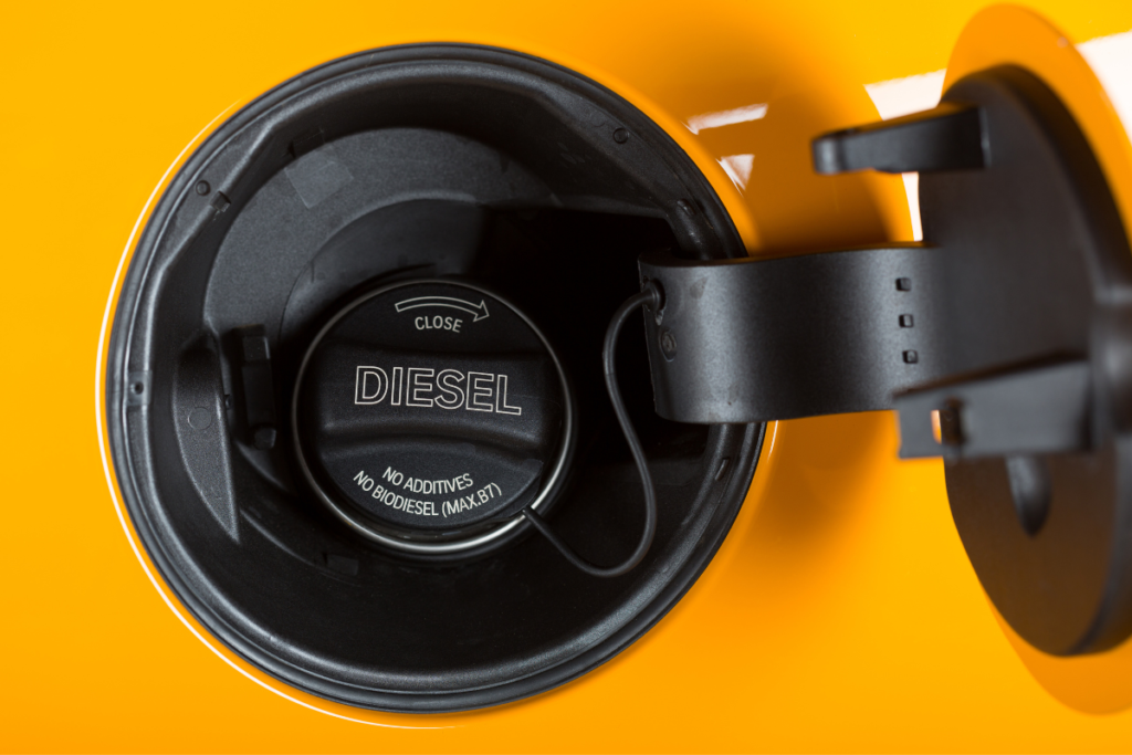 An orange fuel cap open