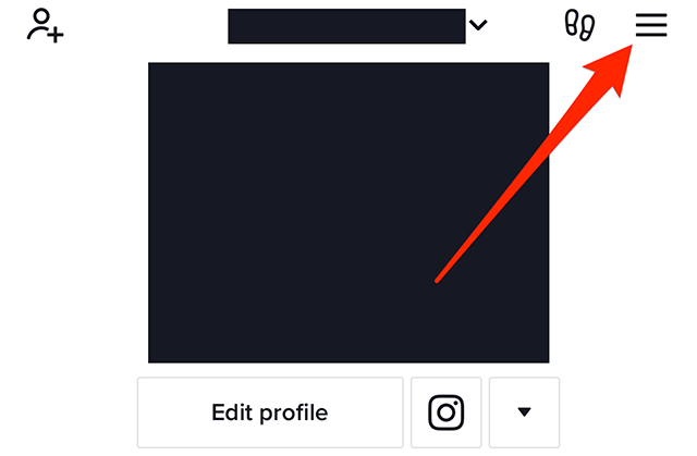 Screenshot of a TikTok user's profile with a red arrow pointing at the three horizontal lines in the top-right corner of the screen