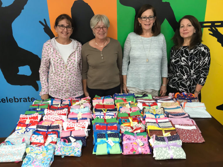 Virginia sewing group creates 72 Popover Sundresses for charity.